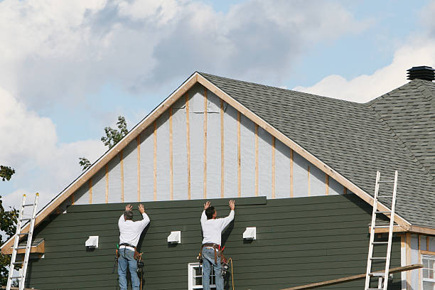 Professional Siding Contractor technician working in Newark, NY